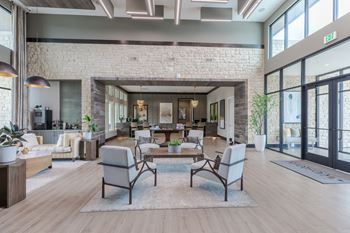 Contemporary clubhouse with business lounge, coffee bar and conference center
